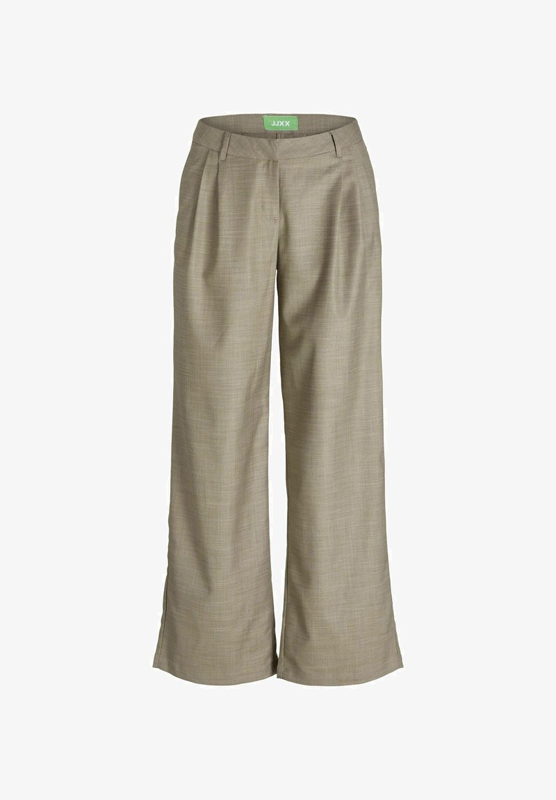 Pantalons large beiges en tissu texturé avec un motif subtil, dotés de plis avant et de poches latérales. Étiquette de logo verte à la taille.