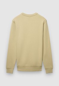 Felpa beige chiaro con scollo rotondo, maniche lunghe e polsini a coste. Texture liscia, senza loghi o motivi visibili.