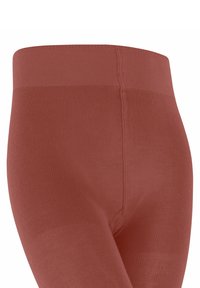 Zbliżenie na legginsy w kolorze rdzy, z prążkowaną teksturą i szerokim pasem, pokazujące elastyczność materiału oraz szczegóły wzoru.