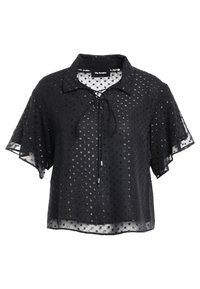 Blouse noire à manches courtes avec col, en tissu transparent, à motif à pois et avec un détail à cordon au niveau du décolleté.