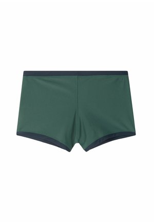 Grüne Badehose aus glattem Stoff. Mit einem dunkelblauen Bund und Saum. Schlichtes, strukturiertes Design ohne Muster oder Verzierungen.