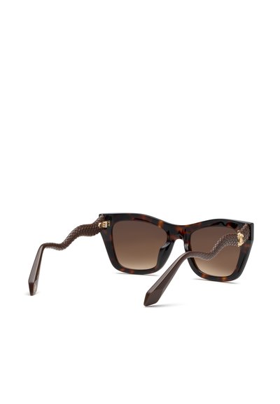 Lunettes de soleil rectangulaires écaille avec verres marron dégradés et branches marron texturées avec un petit détail tête de lion doré.
