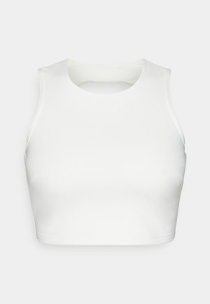 Vit ärmlös crop top i slätt tyg, med rund halsringning och öppen ryggdesign, med snygg sömnad längs kanterna.