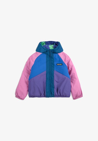 Colorful hooded jacket featuring a mix of pink, blue, and purple panels with elastic cuffs, a front zipper, and a patterned inner lining.