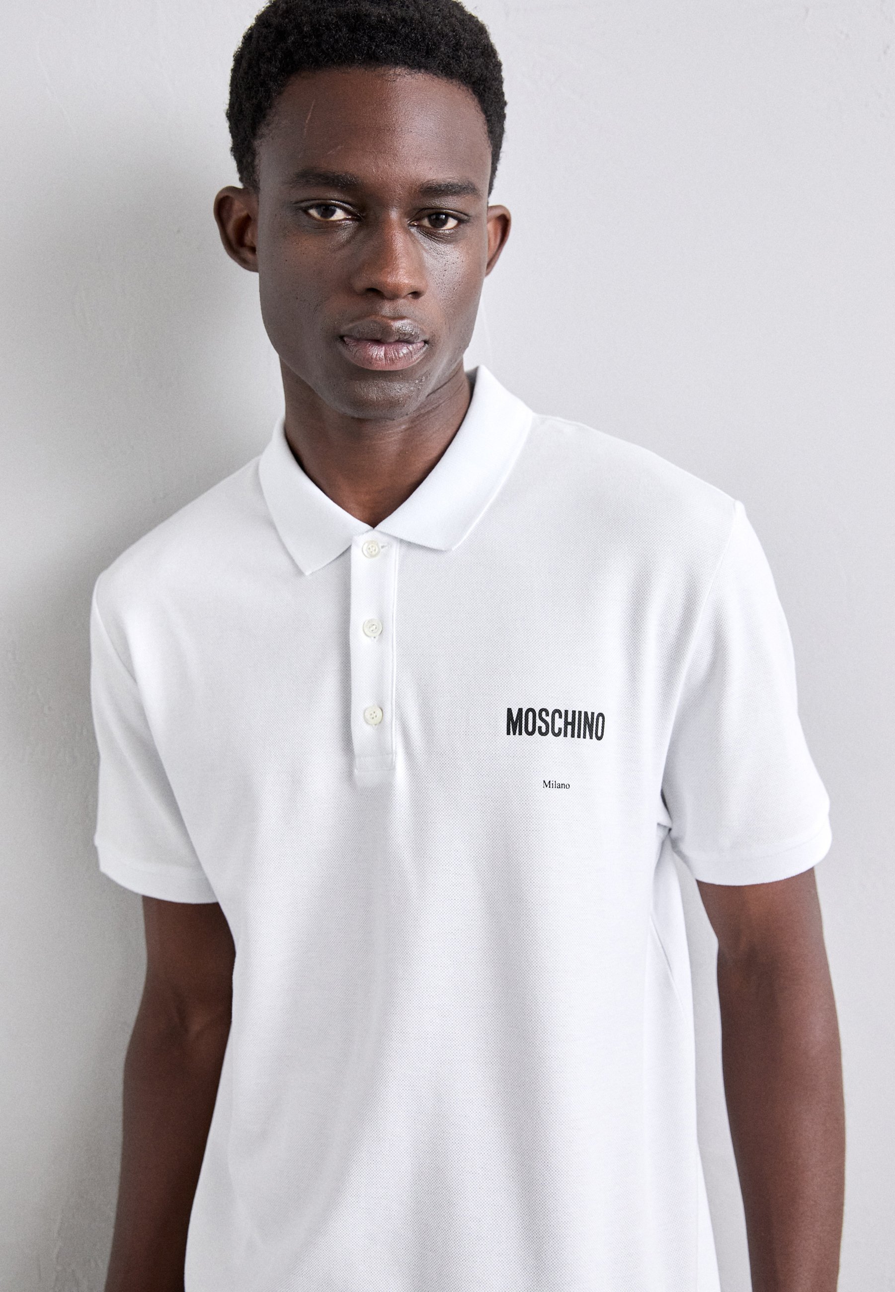 white moschino polo