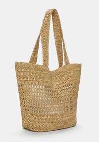 Geflochtene Strohtasche in einem hellen Tannton, ausgestattet mit zwei stabilen Griffen und einem offenen, strukturierten Design mit einem geräumigen Innenraum.