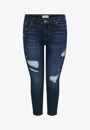 Jeans skinny blu scuro con toppe consumate su cosce e ginocchia, tasche anteriori, chiusura con bottoni e etichetta all'interno della cintura.