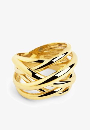 Anillo espiral de oro, que presenta bandas entrelazadas con un acabado brillante, exhibiendo una textura suave y un diseño elegante. Destaca por su giro decorativo.