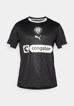 Sort fodboldtrøje med et diskret mønster, hvide accenter på ærmerne og logoer fra Puma og Congstar på fronten.