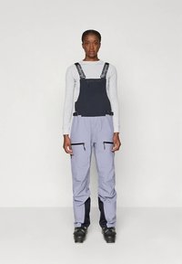 Ski bibs in blue and gray, featuring adjustable straps, zippered pockets, and a fitted design, made from durable, water-resistant material.