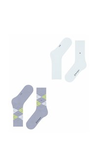 Szare i białe skarpetki z wzorem argyle z zielonymi akcentami oraz para w jednolitym kolorze. Obie pary mają nadrukowane logo.