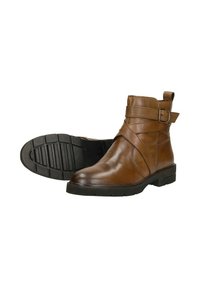 Bruine leren enkelboots met een gespstrap, een gladde afwerking, ronde neus en een gestructureerde zwarte rubberen zool.