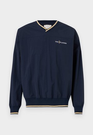 Navy pullover with a V-neck, long sleeves, elastic hem, and gold-accented cuffs. Features "THE PLAYERS" embroidered on the chest.