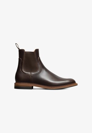 Braune Leder Chelsea-Stiefel mit glatter Oberfläche, elastischen Seitenpaneelen, Schlaufe und einer kontrastierenden Holzsohle mit schwarzem Rand.