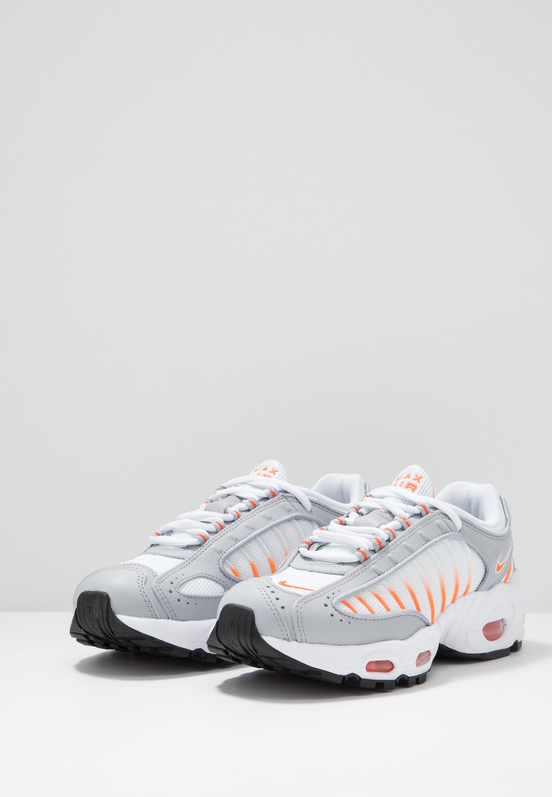 nike tailwind white orange