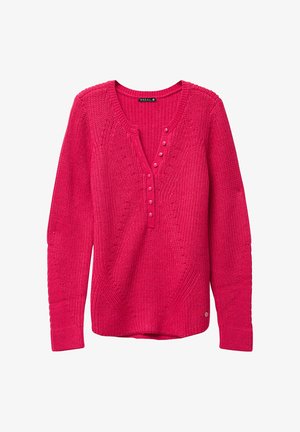 Pull en tricot rose avec un décolleté en V, boutons décoratifs et motif texturé. Présente des poignets côtelés et un ourlet arrière légèrement plus long.