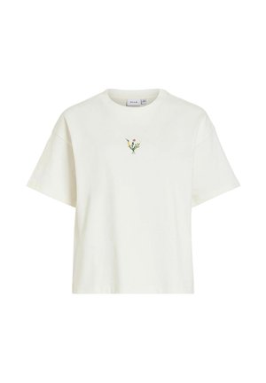 T-shirt blanc à manches courtes avec de petites fleurs sauvages jaunes et roses brodées au centre, juste en dessous de l'encolure.