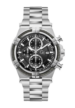Silberne Metall-Chronograph-Armbanduhr mit schwarzem Zifferblatt, drei Hilfszifferblättern, Datumsfenster bei 3 Uhr, Tachymeterskala und Gliederarmband aus Metall.