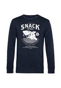 Marinblå sweatshirt i bomull med en hajgrafik och texten "SNACK ATTACK." Rund halsringning, långa ärmar, ribbade mudd och nederkant.