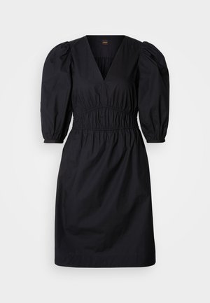 Black dress with puffed sleeves, deep V-neck, and gathered waist. Smooth fabric with a relaxed fit, knee-length design. Simple and versatile.