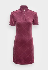 Velvet polo dress in deep burgundy with gold hardware, featuring a zip collar and tonal embroidered pattern across the fabric. Short sleeves.