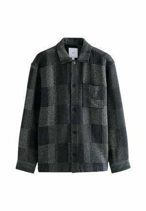 Schwarze und graue karierte Jacke aus einem wollähnlichen Material, mit Kragen, Knöpfen und einer aufgesetzten Tasche auf der linken Seite.