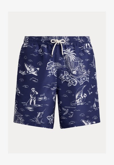 Marineblauwe zwembroek met witte tropische eilandscènes, palmbomen, beren die suppen en zeilen, een vliegtuig en bloemmotieven. Trekkoord in de taille.