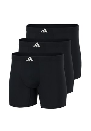 Drei schwarze Herren-Boxershorts mit kleinem weißem Adidas-Logo am Bund, in versetzter Anordnung.