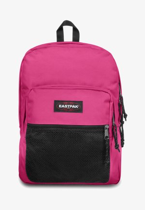 Zaino Eastpak rosa con tasca anteriore in rete nera, patch con logo, maniglia superiore e spallacci regolabili. Tessuto liscio e resistente.