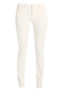 Jean skinny en denim blanc avec taille haute, design classique à cinq poches, fermeture à bouton sur le devant et détails de couture subtils.