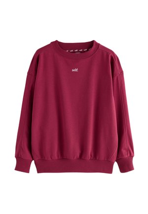 Sudadera burdeos con cuello redondo, puños y dobladillo acanalados, con pequeño texto blanco "self." centrado en el pecho.