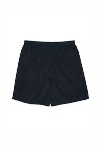 Shorts neri con elastico in vita, realizzati in tessuto morbido, con una texture liscia e due tasche laterali, dal fit rilassato e lunghezza a metà coscia.