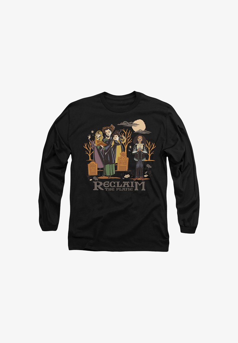 Four witches stand among gravestones and bare trees under a full moon, with the text "Reclaim the flame" below them on a black shirt.