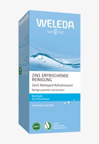 2-in-1 verfrissend reinigingsproduct in een blauwe en witte doos. Heeft een watermotief met tekst in meerdere talen en eco-certificeringslogo's.