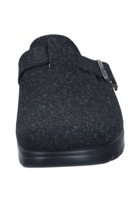 Black wool-textured slip-on clog with adjustable side buckle and smooth black sole, shown from front view.