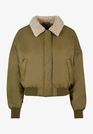 Giubbotto bomber verde oliva con colletto in shearling, polsini e vita a coste, caratterizzato da una parte anteriore trapuntata e tasche laterali.
