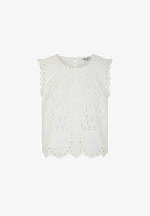 Blouse blanche sans manches avec bords festonnés et broderie florale découpée élaborée sur le devant et les manches.