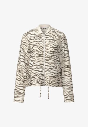 Giacca bomber cropped in crema con motivo a strisce zebra grigie. Caratterizzata da una zip frontale, orlo con cordino e polsini a costine. Texture morbida.