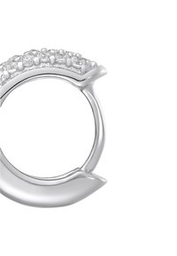 Silver ring featuring a curved design and a row of small clear stones, showcasing a smooth, polished finish and subtle accents.