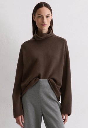 - Sweter