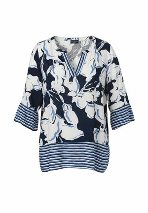 Florale tuniek met marineblauwe en lichtblauwe patronen, V-hals, driekwart mouwen en gestreepte onderrand. Gemaakt van lichte stof.