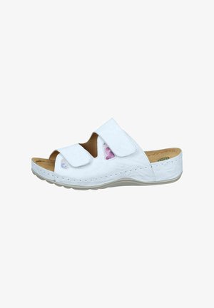 White open-toe sandal with two adjustable Velcro straps, cushioned tan insole, and a low, contoured grey sole.