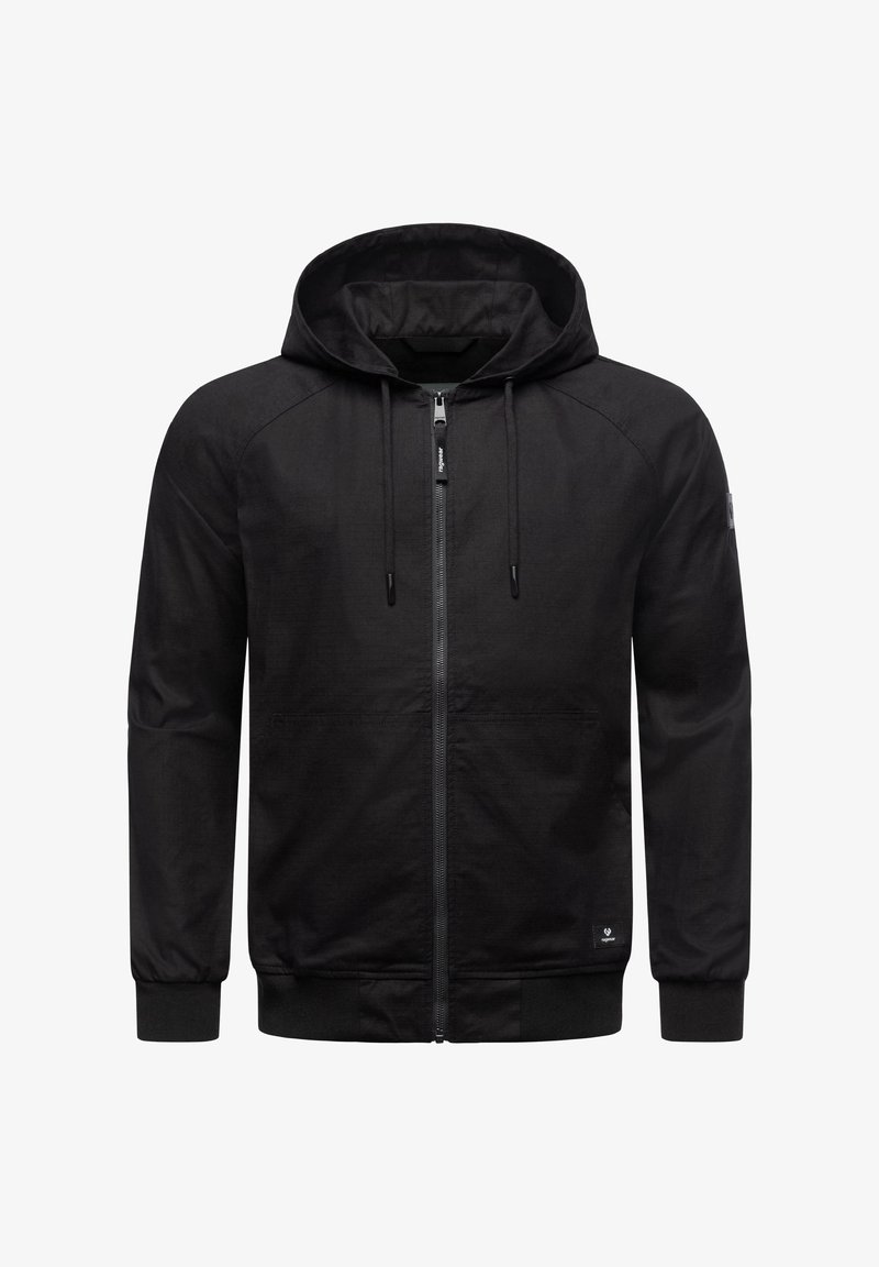 Black zip-up hoodie with a drawstring hood, ribbed cuffs and hem, and two front pockets. Features a smooth texture and minimal branding.
