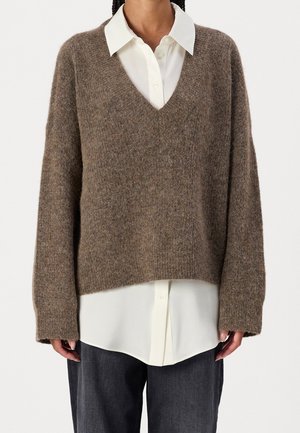 Stickad tröja - brown