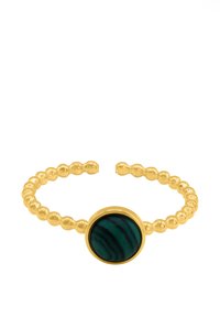 Bracelet manchette en perles dorées présentant une pierre de malachite ronde centrale avec des rayures vertes et noires. Fini lisse avec une surface polie.