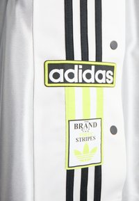 adidas Originals MEGABREAK - Pantaloni sportivi - grey