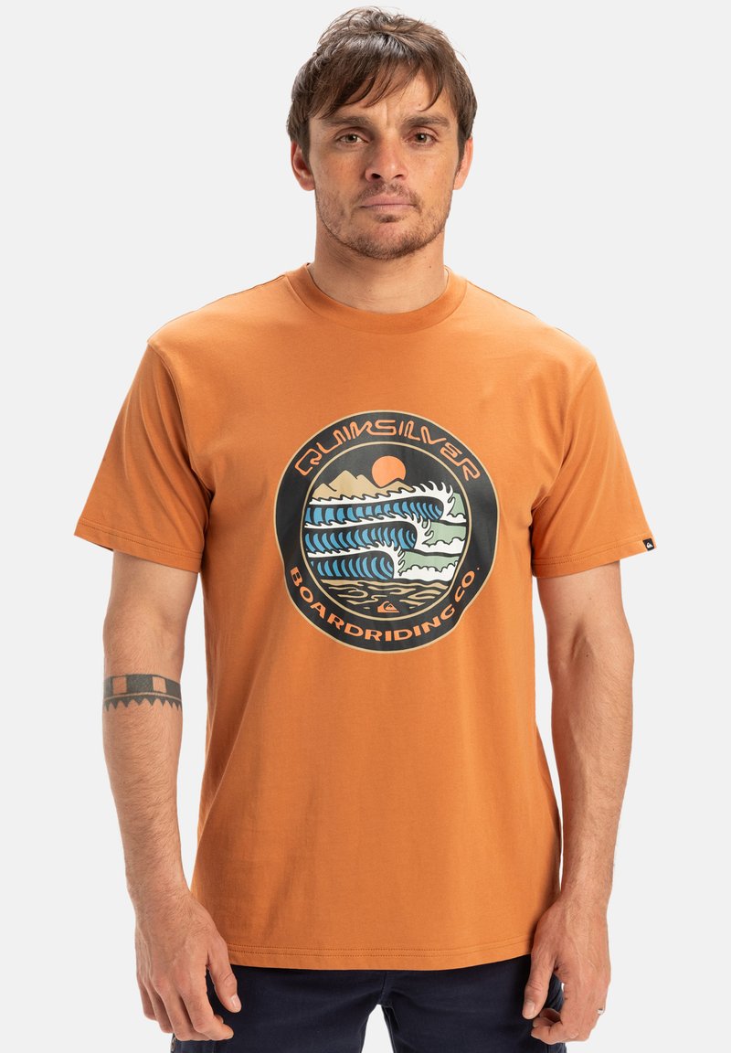 Short-sleeve orange cotton T-shirt featuring a circular graphic print of waves, mountains, and a sun, with similar colors and black accents.