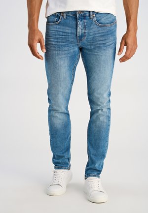 - Jeansy Slim Fit