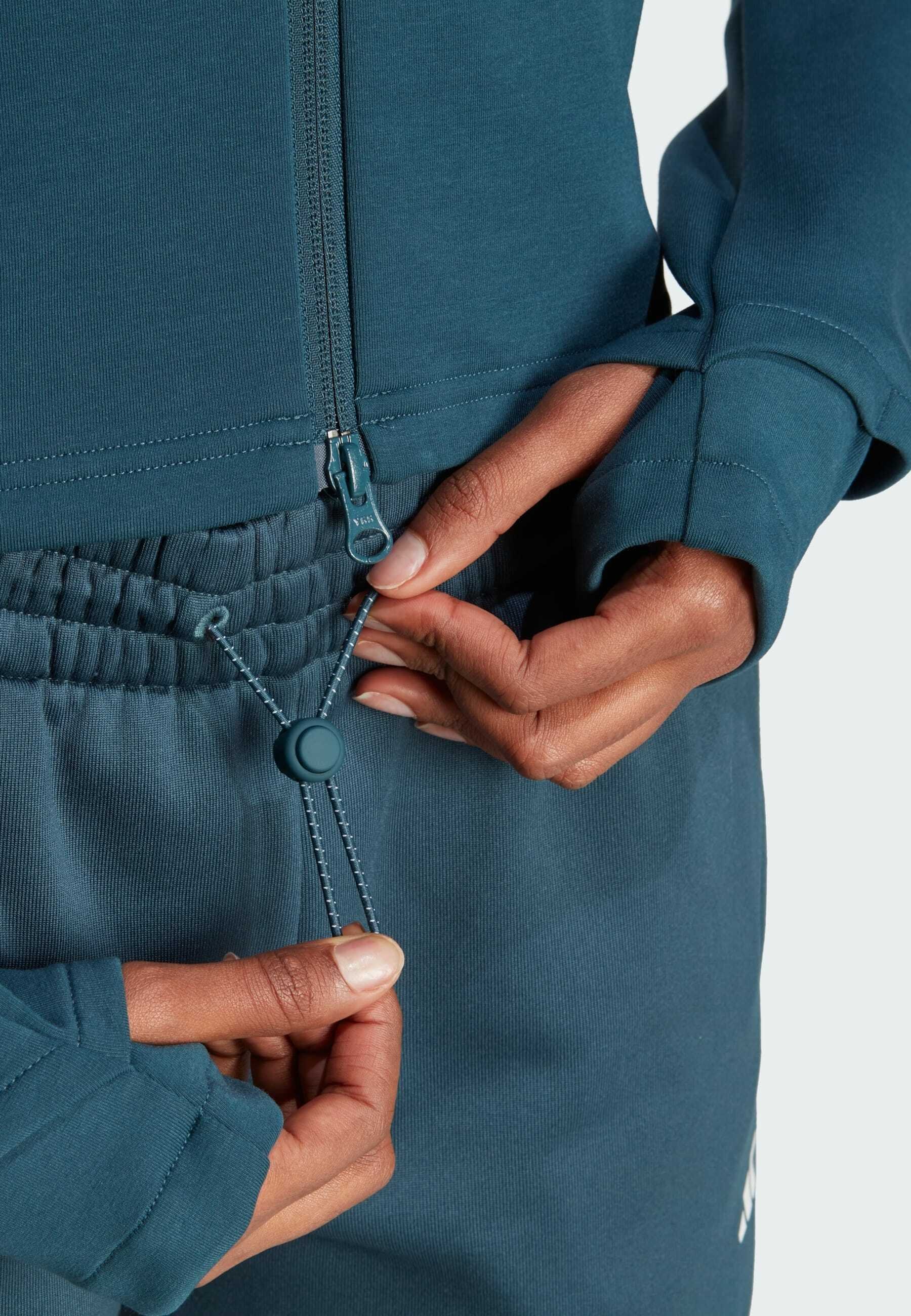 turquoise adidas tracksuit