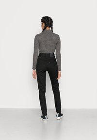 Levi's® Made & Crafted HIGHRISE SLIM - Calças de ganga justas - stay black